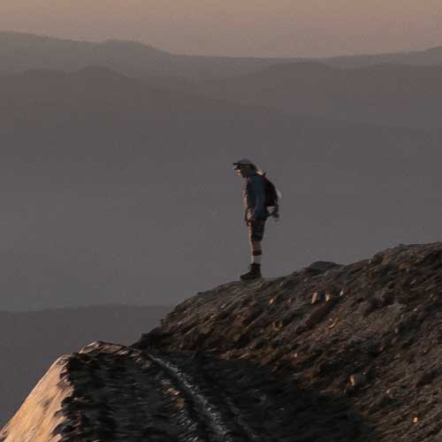 Cayce Grove Probate Law - hiker looking out over a cliff